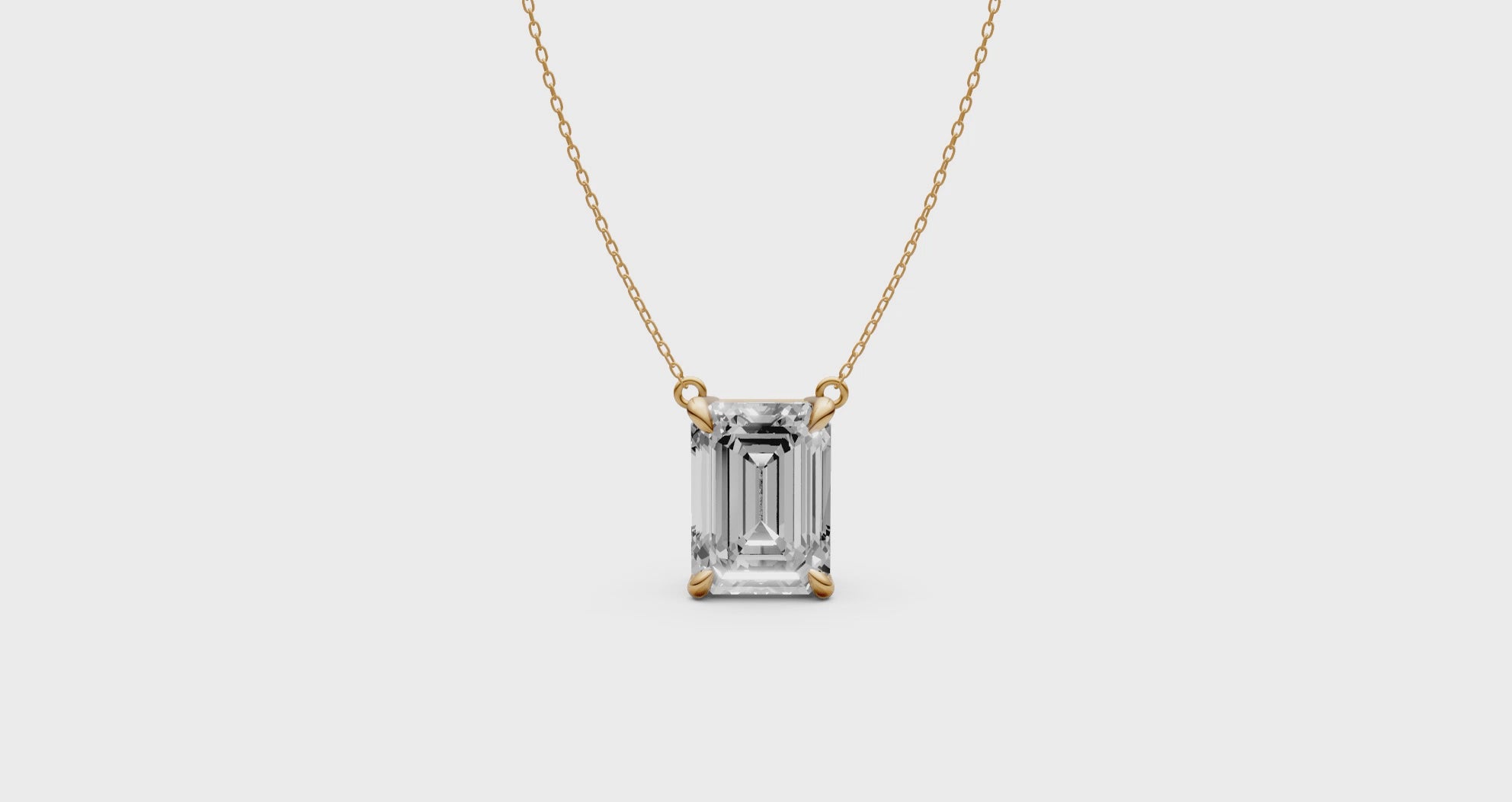 Emerald Cut Diamond Pendant in 18KT Gold Four-Prong