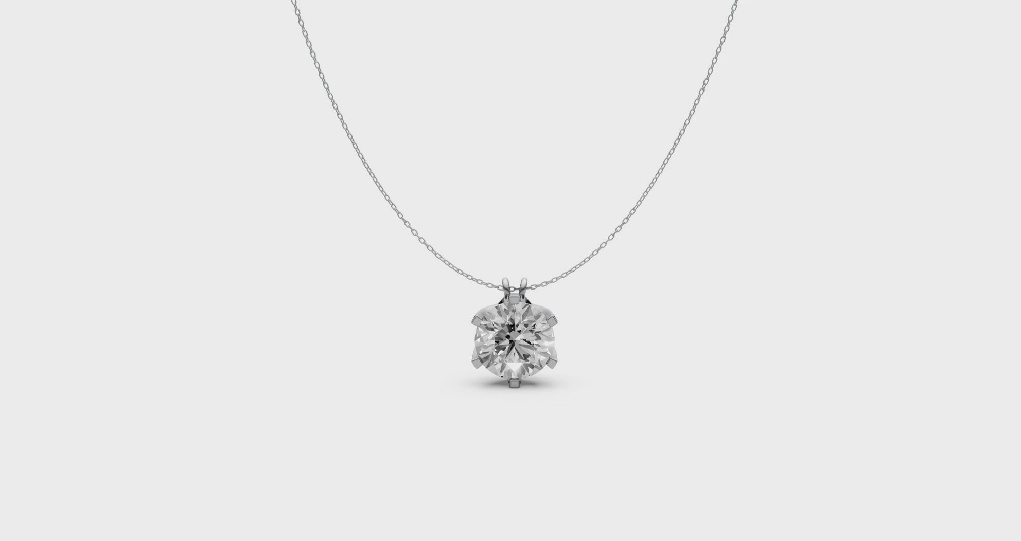 Round Diamond Pendant in 18KT Gold Six-Prong Scallop Setting.